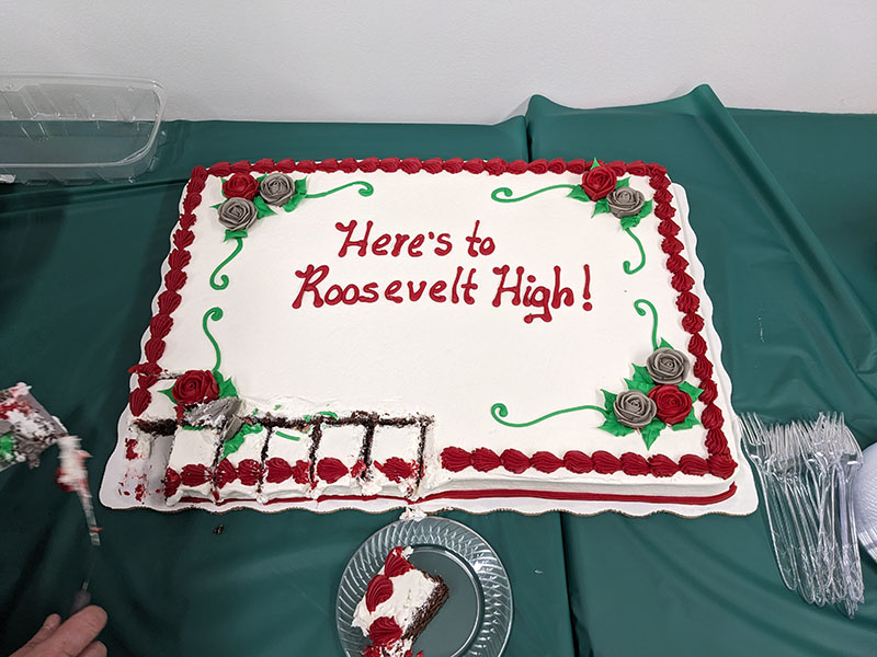 Photo of a sheet cake with Here's to Roosevelt High written on top