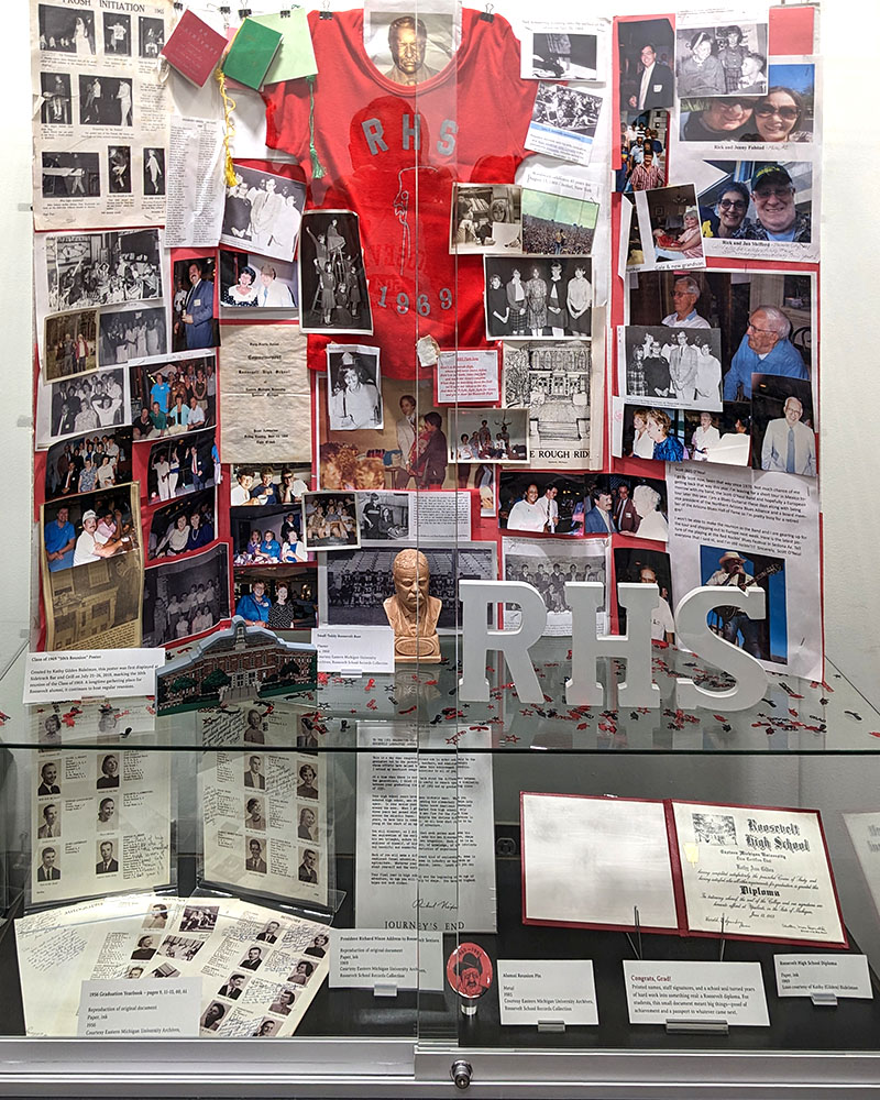 Photo of a display case containing photos and memorabilia from Roosevelt High